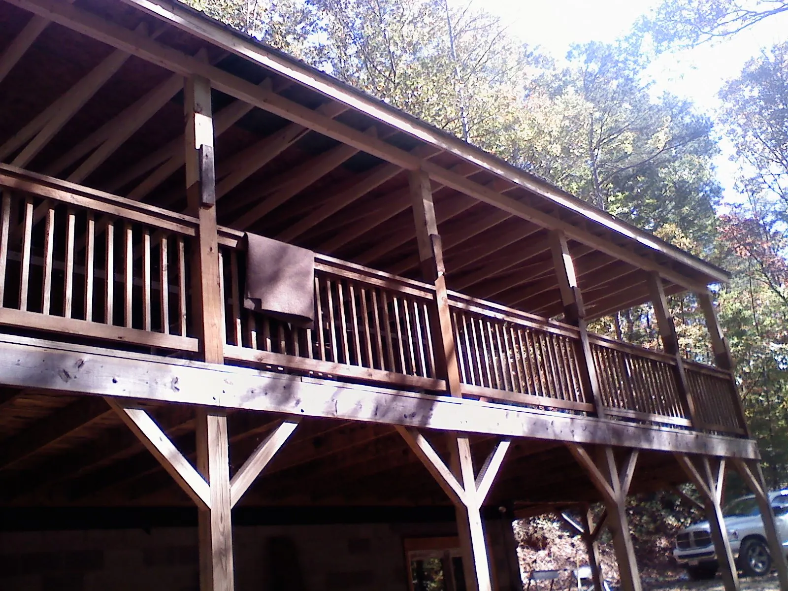 Timber framing under a new elevated porch and deck — Roof Leak Repair in Hope Mills by Roofing Brothers